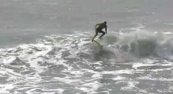 kickflip en surf